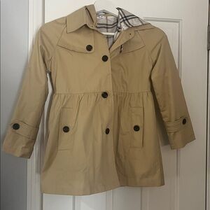 Girls tan trench coat with Plaid Lining
